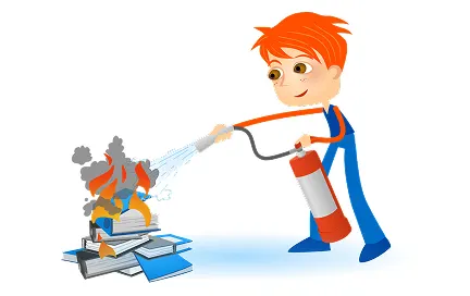 Boy with orange hair spraying water from a hose onto a fire on stacked materials